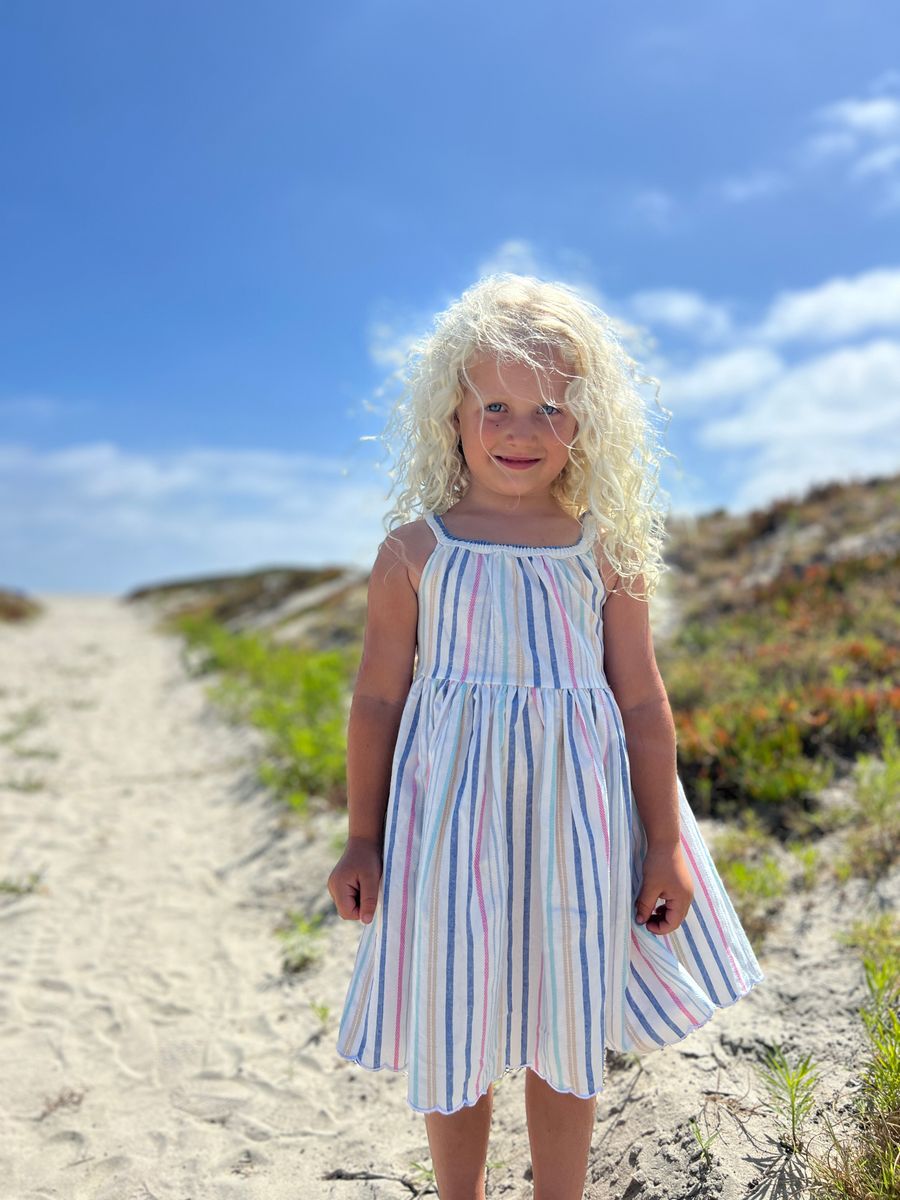 vignette, white, spaghetti strap dress, with stripes of pink, blue, and yellow