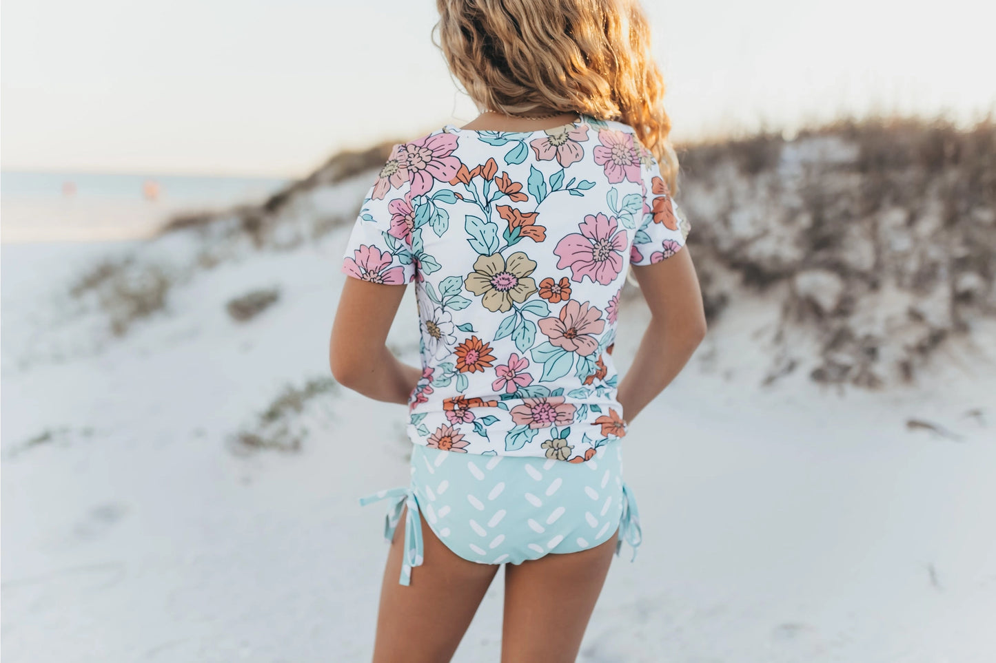 Oopsie Daisy Kid's Pale Pink Floral & Mint Sea Rash Guard Swimsuit