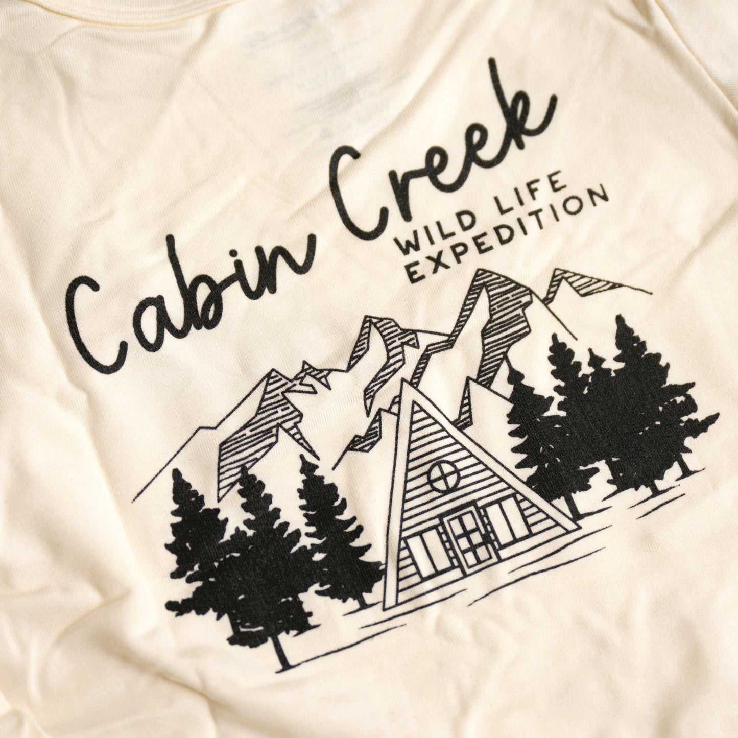 babysprouts, long sleeve, boys, tee,with a cabin and tree scene. outdoorsy. white