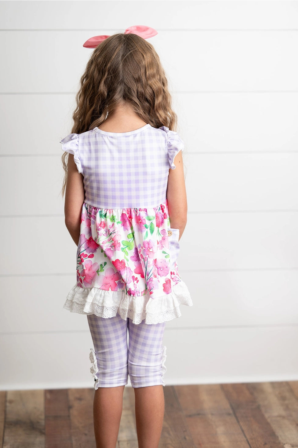 Oopsie daisy, floral checkered, sleeveless, tunic, florals and ruffle sleeves, checkered capri pants with buttons