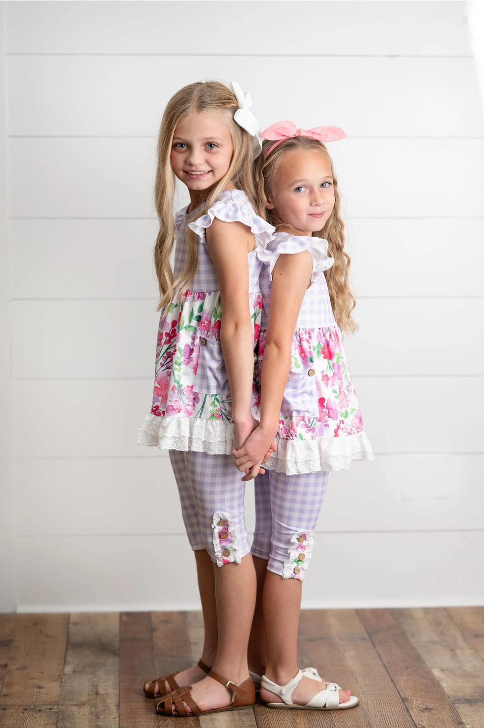 Oopsie daisy, floral checkered, sleeveless, tunic, florals and ruffle sleeves, checkered capri pants with buttons