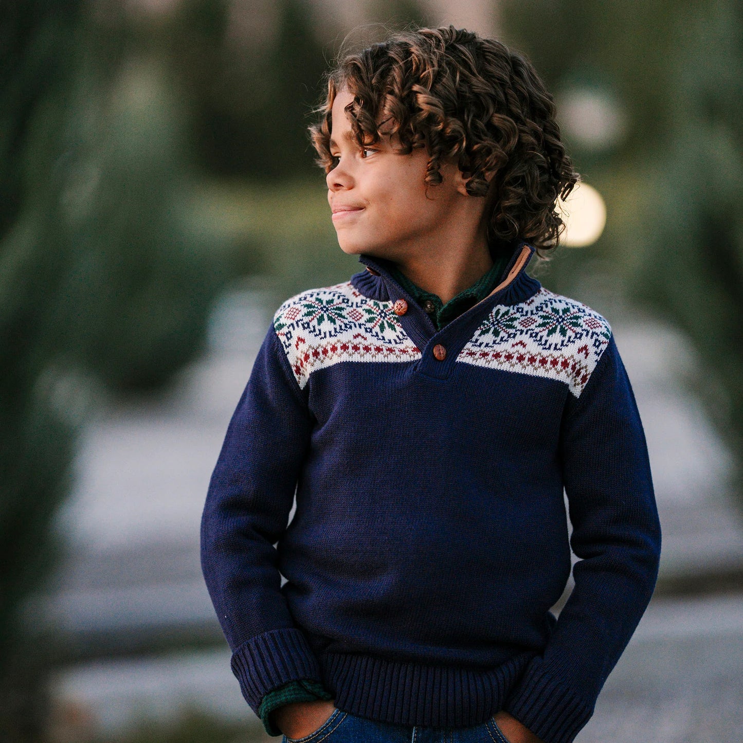 young boy wearing Hope & Henry organic mock neck sweater with Scottish snowflake pattern