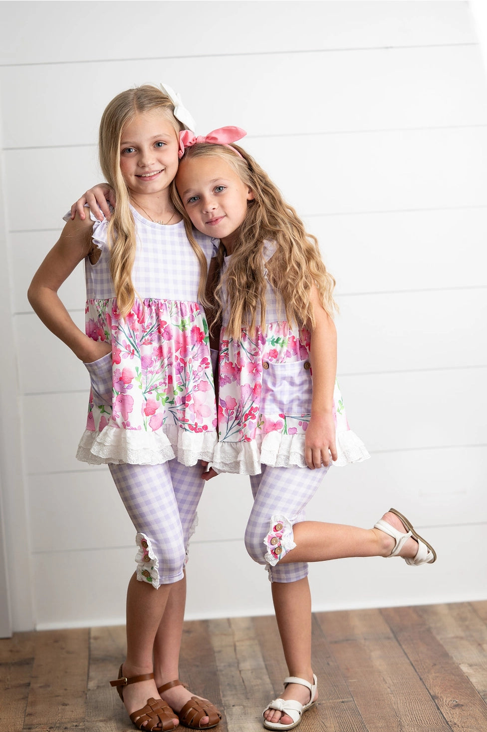 Oopsie daisy, floral checkered, sleeveless, tunic, florals and ruffle sleeves, checkered capri pants with buttons