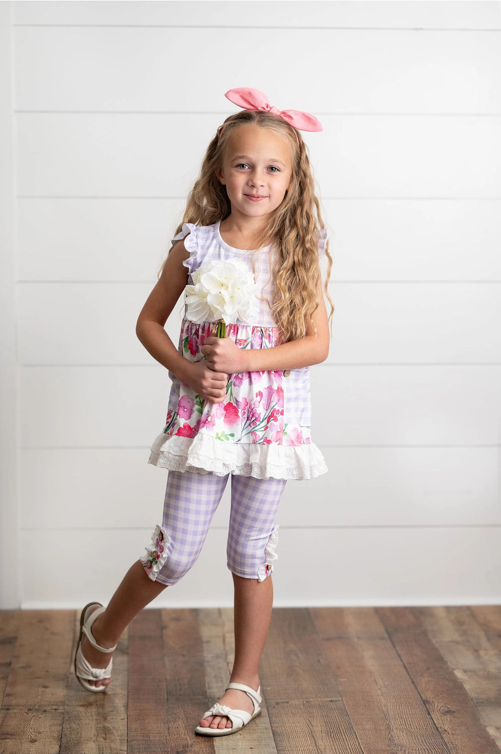 Oopsie daisy, floral checkered, sleeveless, tunic, florals and ruffle sleeves, checkered capri pants with buttons