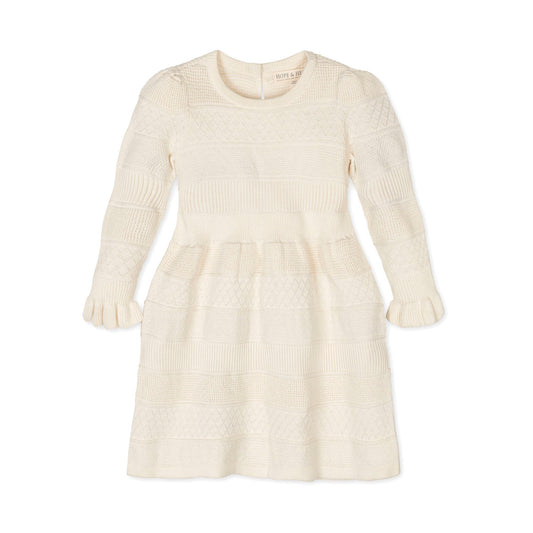 Cream-colored knit dress on a white background