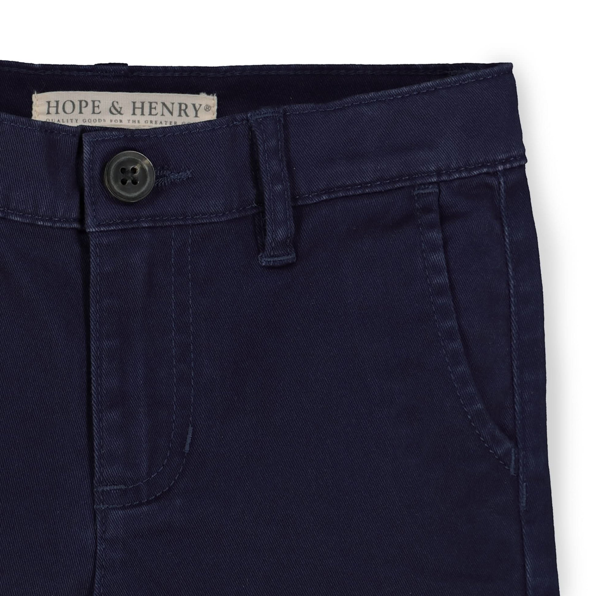 Navy blue pants with a button and 'Hope & Henry' label on a white background