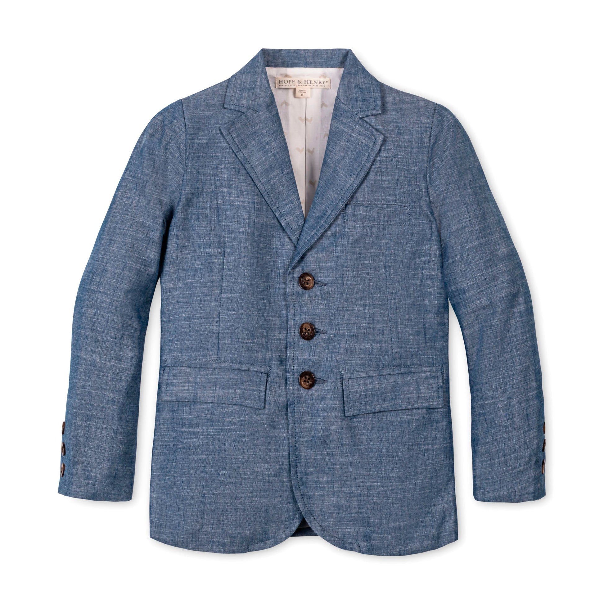 Blue chambray blazer with brown buttons on a white background