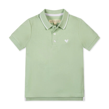 Green polo shirt on a white background