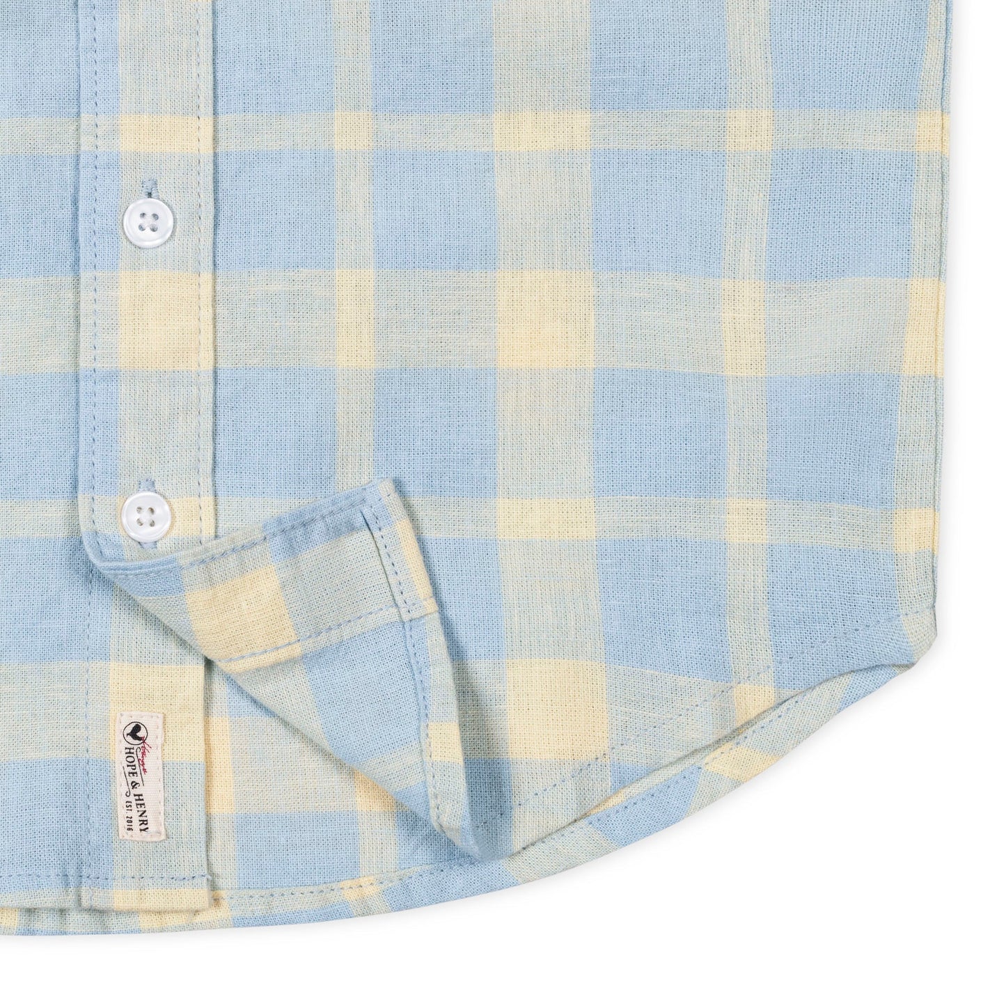Blue and yellow plaid short sleeve collared shirt on a white background