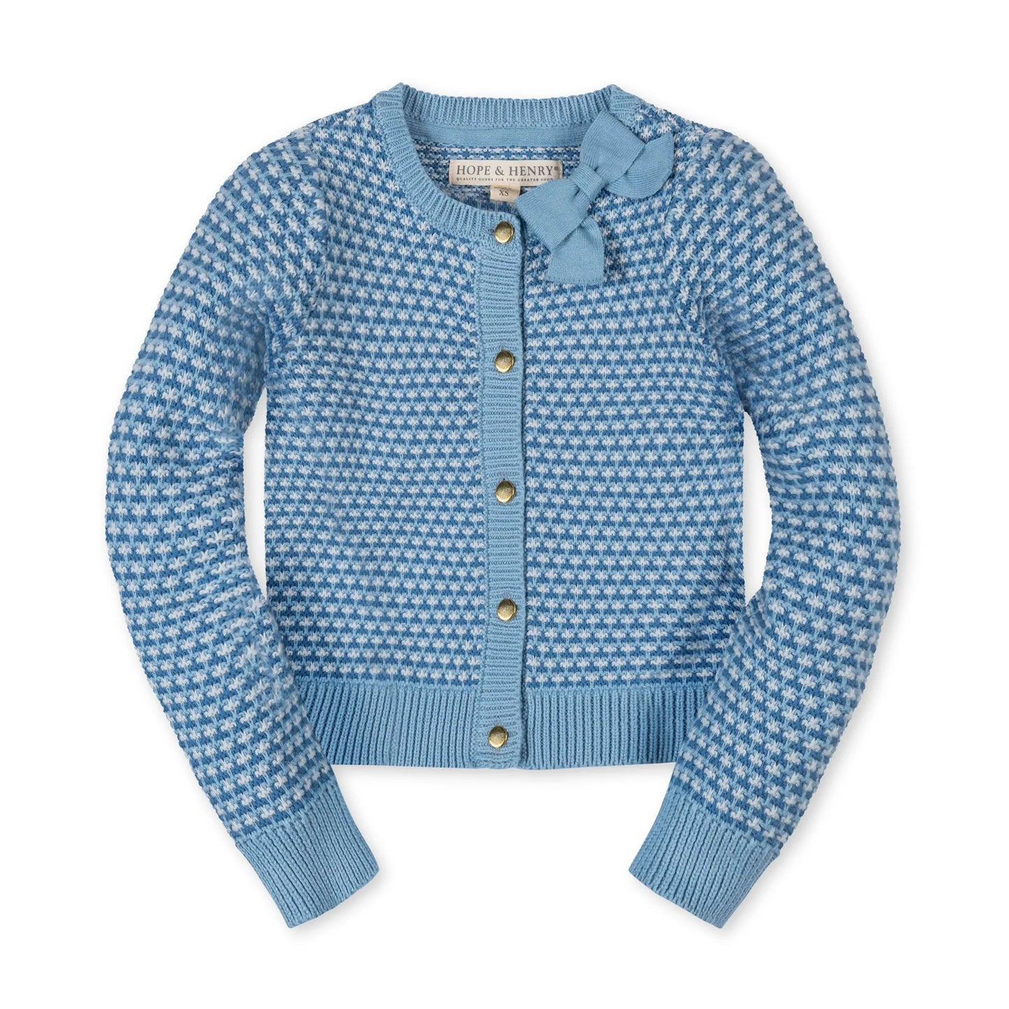 Blue patterned cardigan with gold buttons on a white background