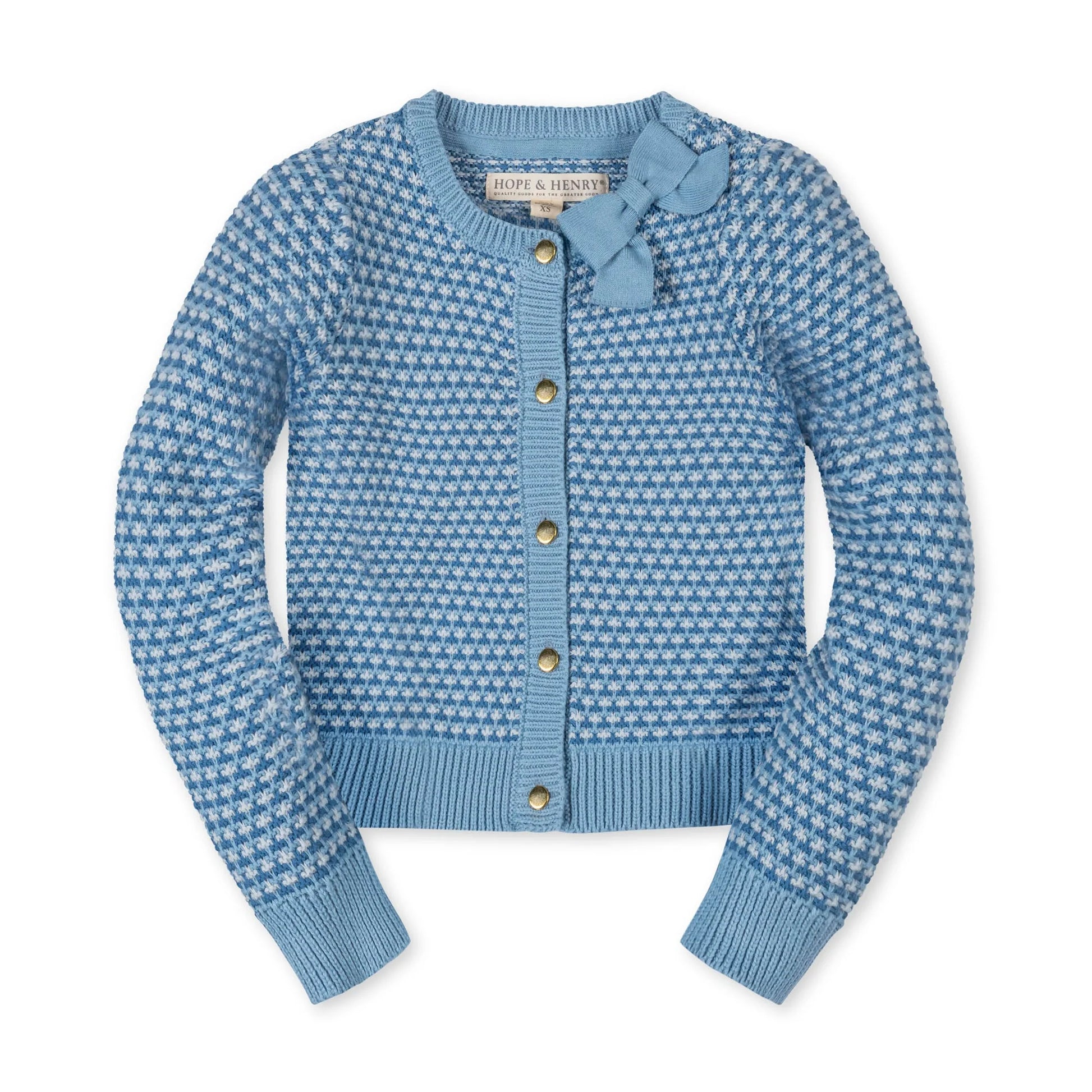 Blue patterned cardigan with gold buttons on a white background