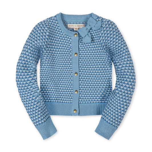 Blue patterned cardigan with gold buttons on a white background