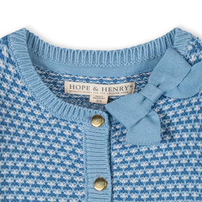 Blue knitted cardigan with white pattern and 'Hope & Henry' label on a white background