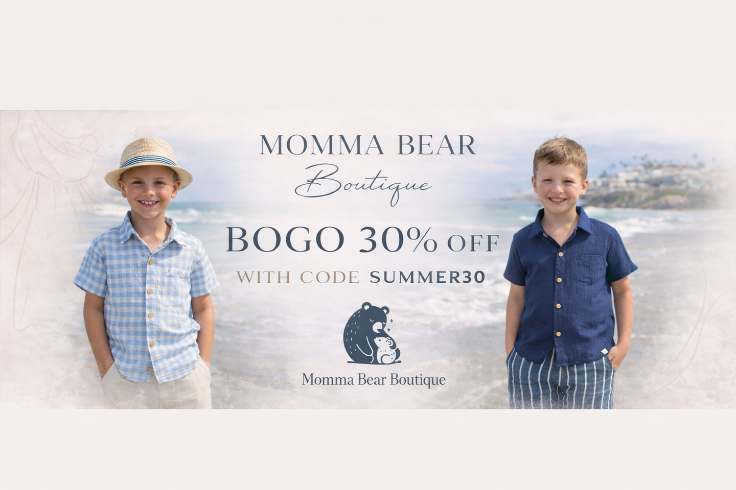 Two boys standing on a beach dressed in Me & Henry with promotional text for Momma Bear Boutique.
