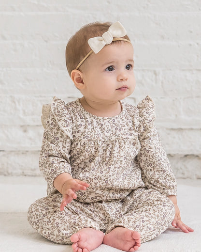 Baby wearing Colored Organics Aurora Floral Ruffle Sleeve Romper