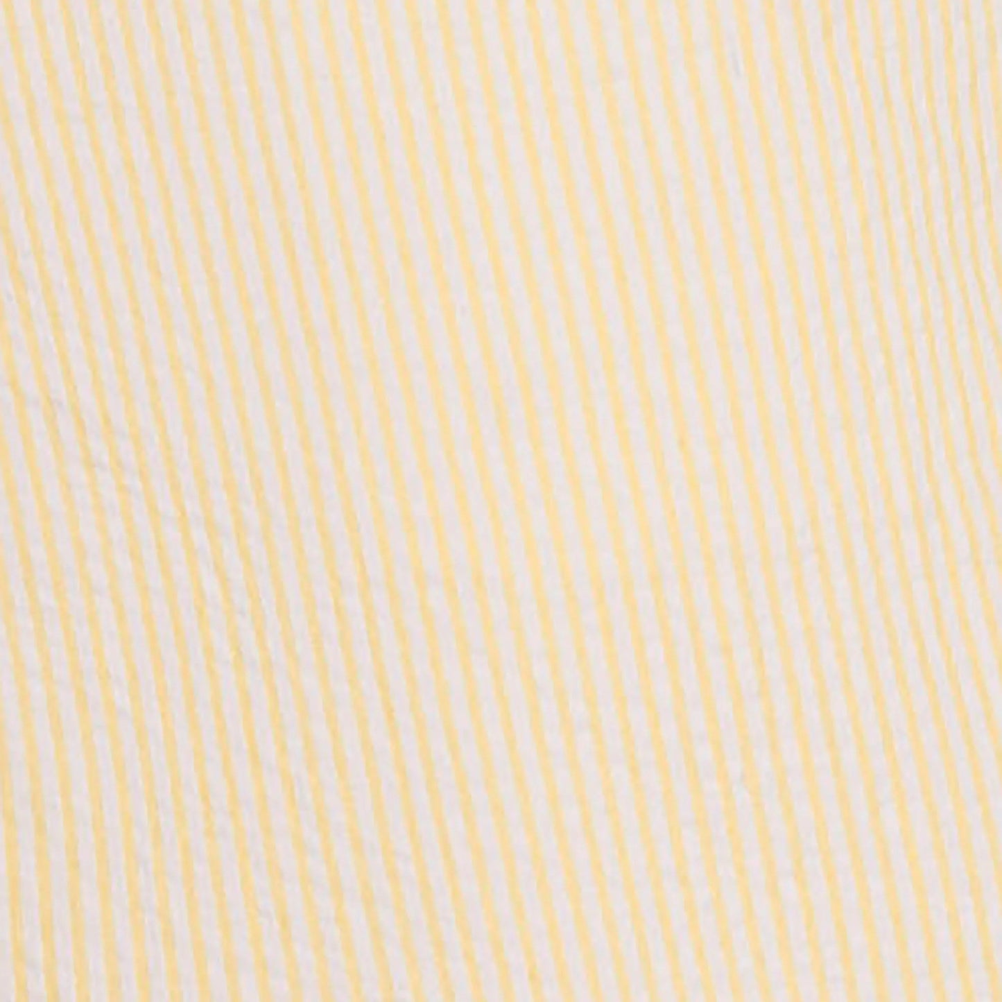 Closeup of yellow 100% organic cotton seersucker short sleeve shirt for boys by Hope and Henry.
