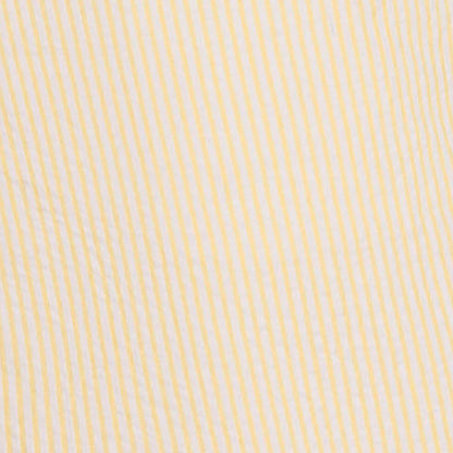 Closeup of yellow 100% organic cotton seersucker short sleeve shirt for boys by Hope and Henry.
