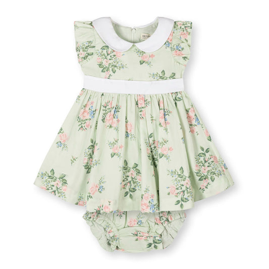 Little girls green floral organic cotton sateen party dress with a white Peter Pan collar by Hope and Henry.