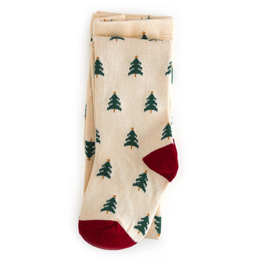 Cream stocking with green tree pattern and red accents on a cream background