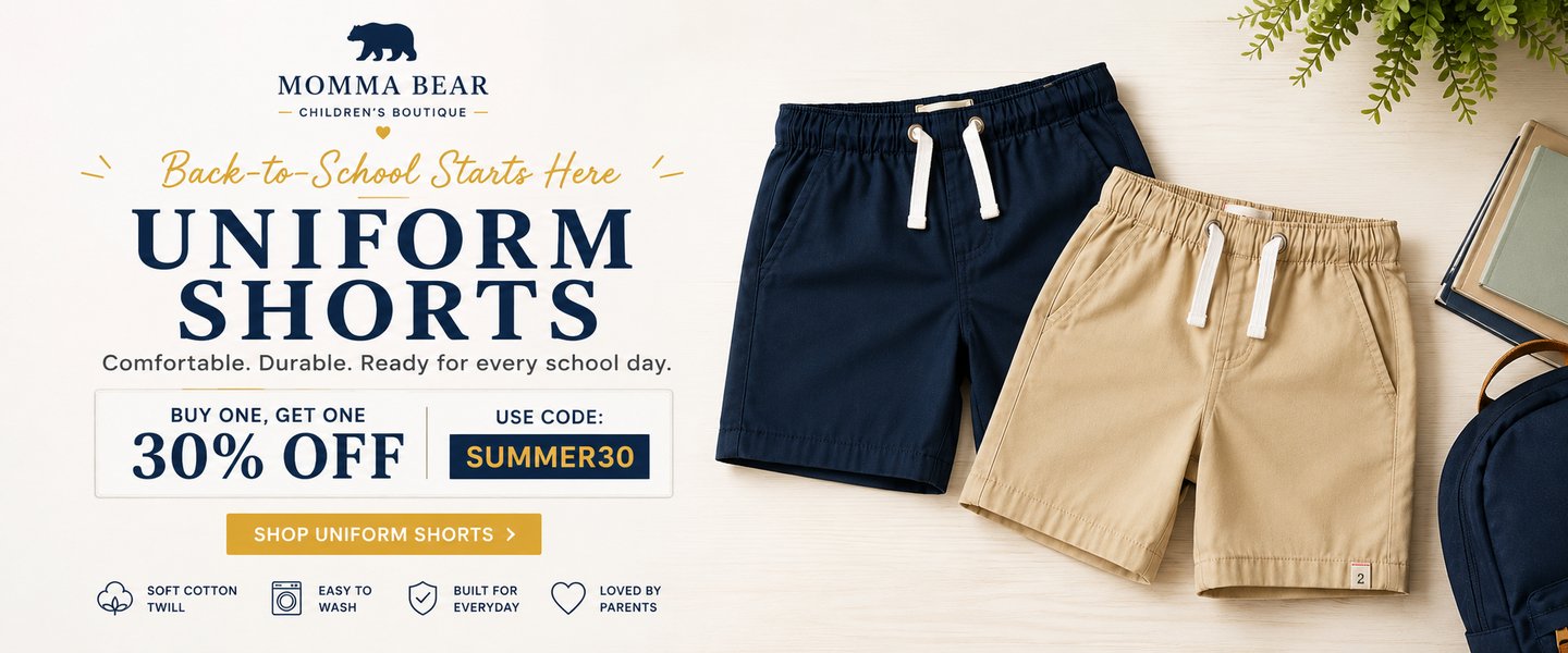 Back-to-school promotion featuring navy and stone boys' uniform shorts. Buy one pair, get the second 30% off with code SUMMER30 at Momma Bear Children's Boutique.