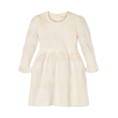 Cream-colored knit dress on a white background