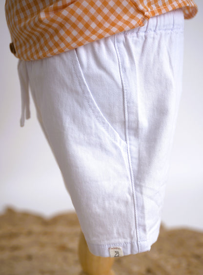 Me & Henry white twill shorts with an elastic waist and drawstring

